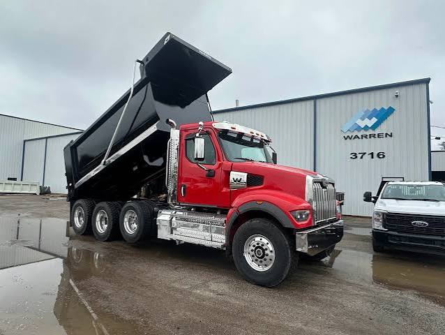 Merica Hauling Company dump truck with bed raised